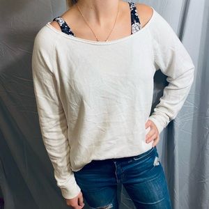 Aeropostale white long sleeve with a brown and white strips on the back. Large